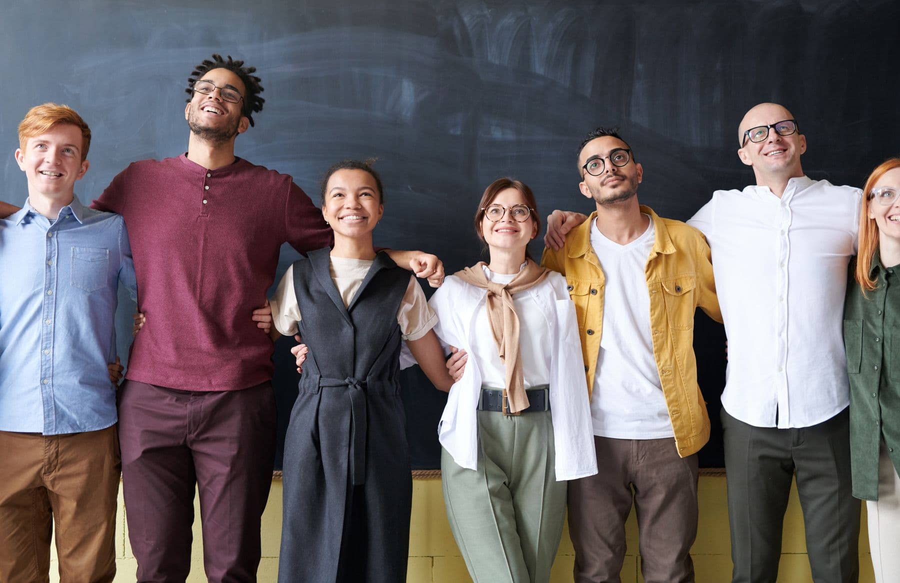 Professional team together in a bright contemporary workplace